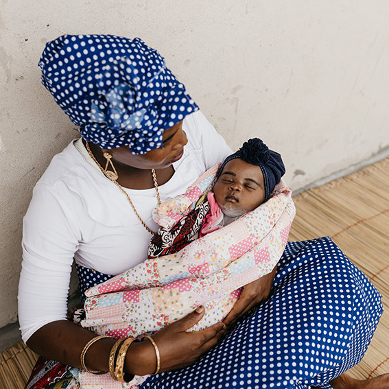 woman holding baby