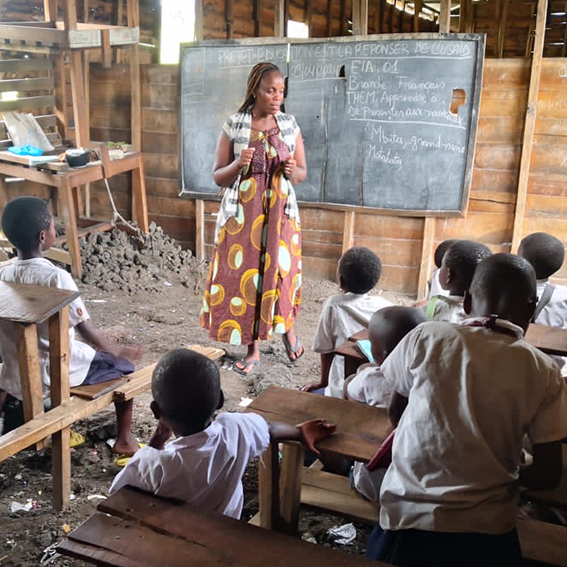 teacher in front of classroom