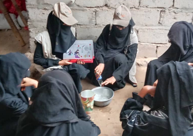 A lead mother demonstrates how to express breast milk during a session. “All humanitarian agencies have the opportunity to protect, promote and support breastfeeding and complementary feeding during emergencies to help prevent mortality and morbidity,” says Alessandro Iellamo, senior emergency nutrition adviser for FHI 360.