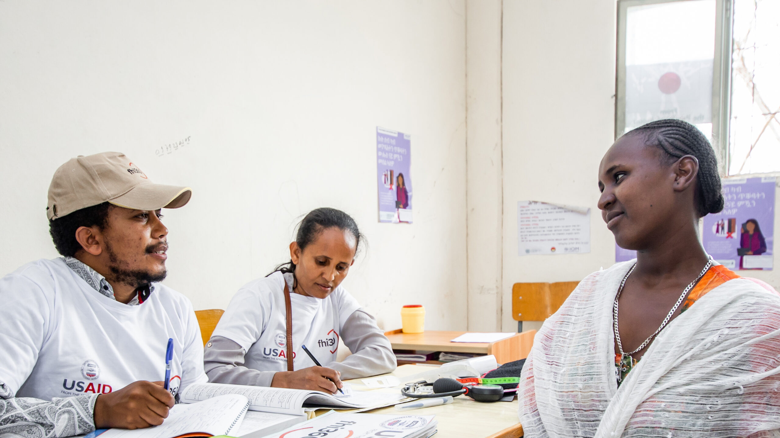 People consulting at a mobile clinic